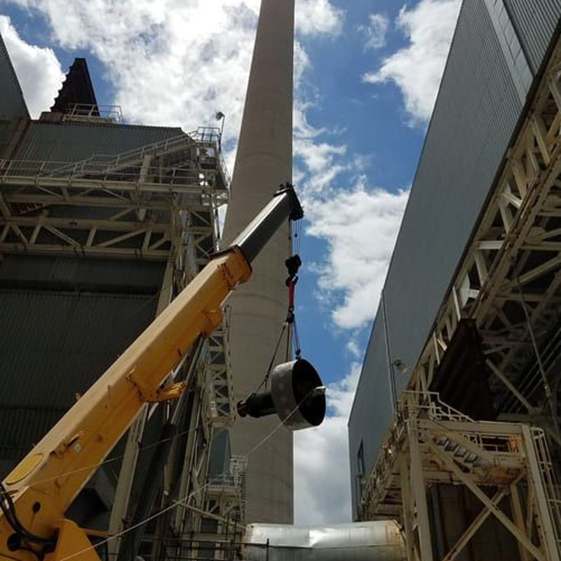 crane lifting piece of equipment